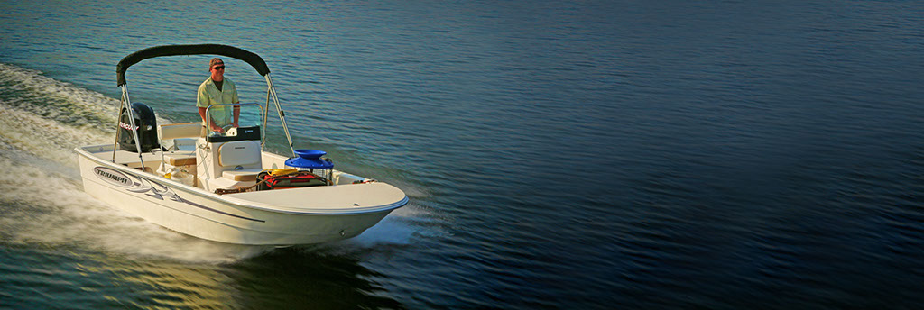 Man in Surf City on Topsail Boat Rental 17 Foot Center Console Triumph Skiff image
