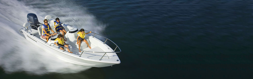 Family in Surf City on Topsail Boat Rental 17 Foot Dual Console Triumph Boat image